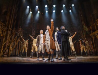 HAMILTON features a score that blends hip hop jazz RB and Broadway 1